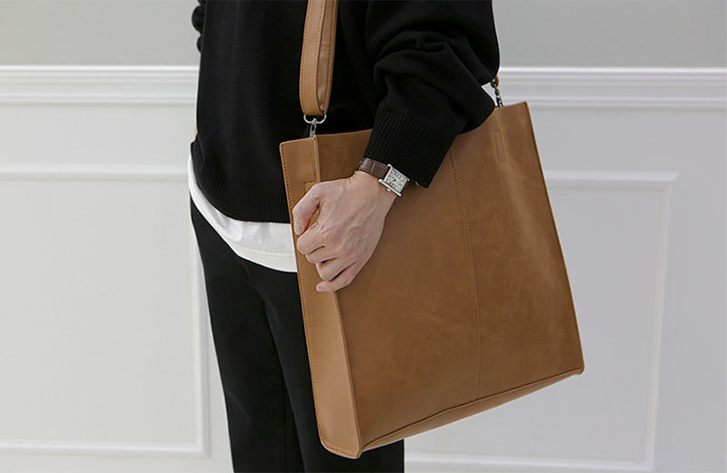 Korean version of fashionable PU leather shoulder bag, simple commuter men's and women's tote bag, square vertical crossbody large-capacity handbag_voghion.com