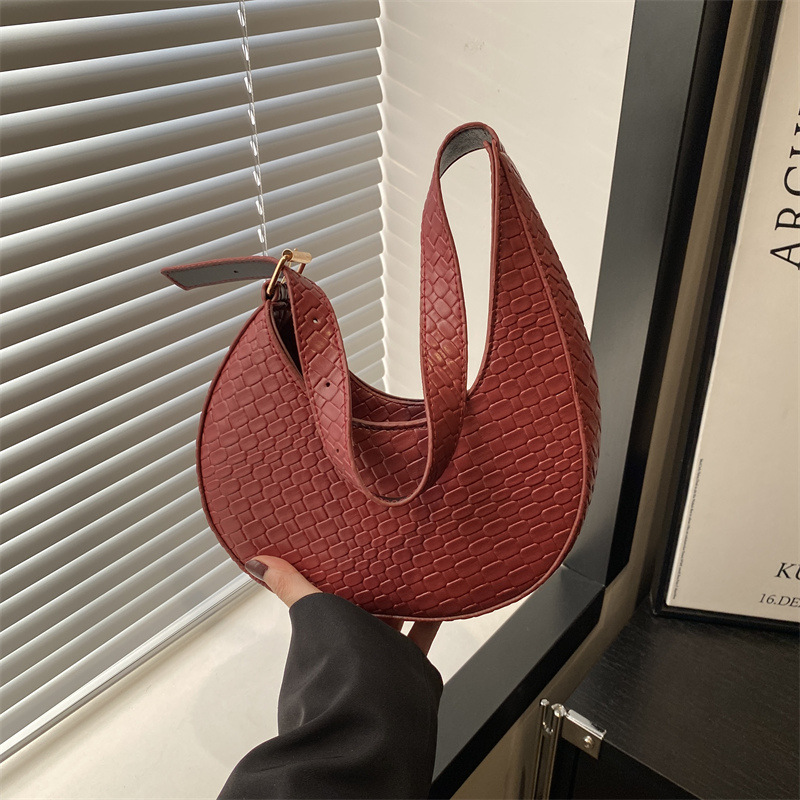 Bolsa de media luna francesa de tejido para mujeres 2025 nueva tendencia correa de hombro ancha textura de moda bolso de hombro bolso debajo de la axila