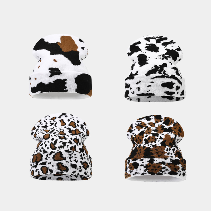 Moda europea y americana Nueva leopardo Jacquard sombrero de punto engrosado cálido hombres y mujeres otoño e invierno Gran circunferencia de la cabeza protección del oído sombrero de lana