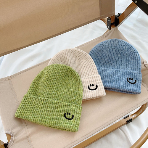 Baby smile knitting hat cream color series baby autumn winter Korean toddler baby rolled edge warm knitting hat cold hat