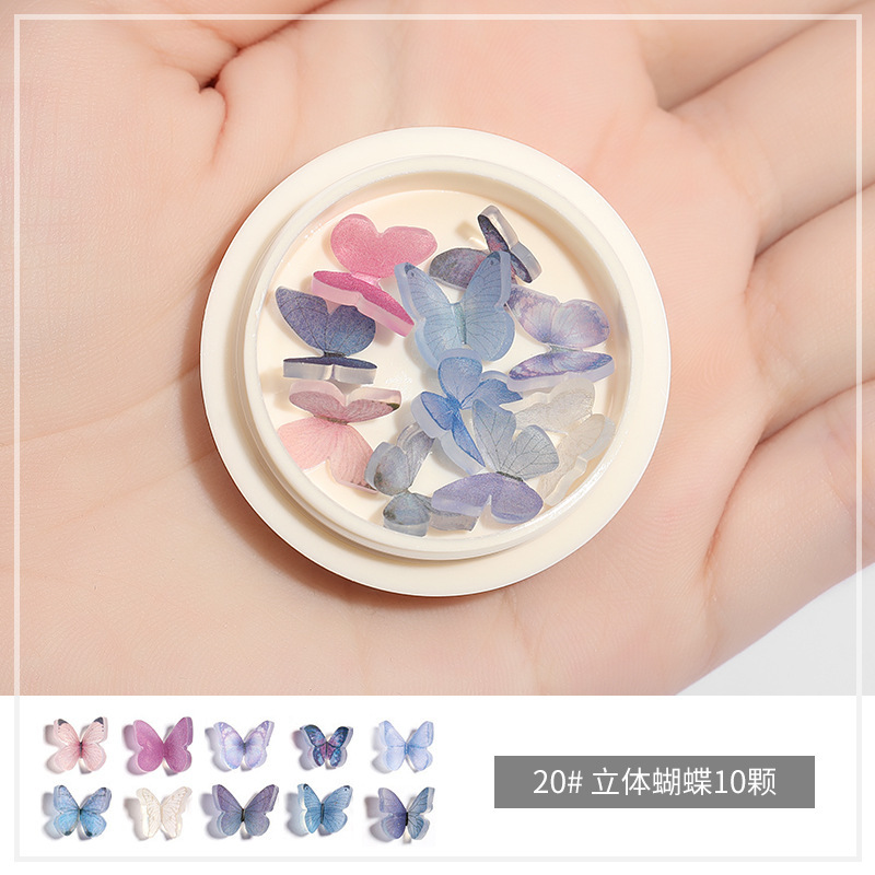 Online popular hielo transparente Aurora mariposa joyería cristal blanco piedra tridimensional uñas diamante Super Flash rhinestone uñas joyería