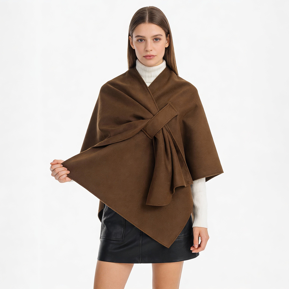 Accesorios de viaje de alta calidad otoño y invierno nuevos chalecos de punto de mujer con chalecos perforados cruzados con un diseño de moda retro