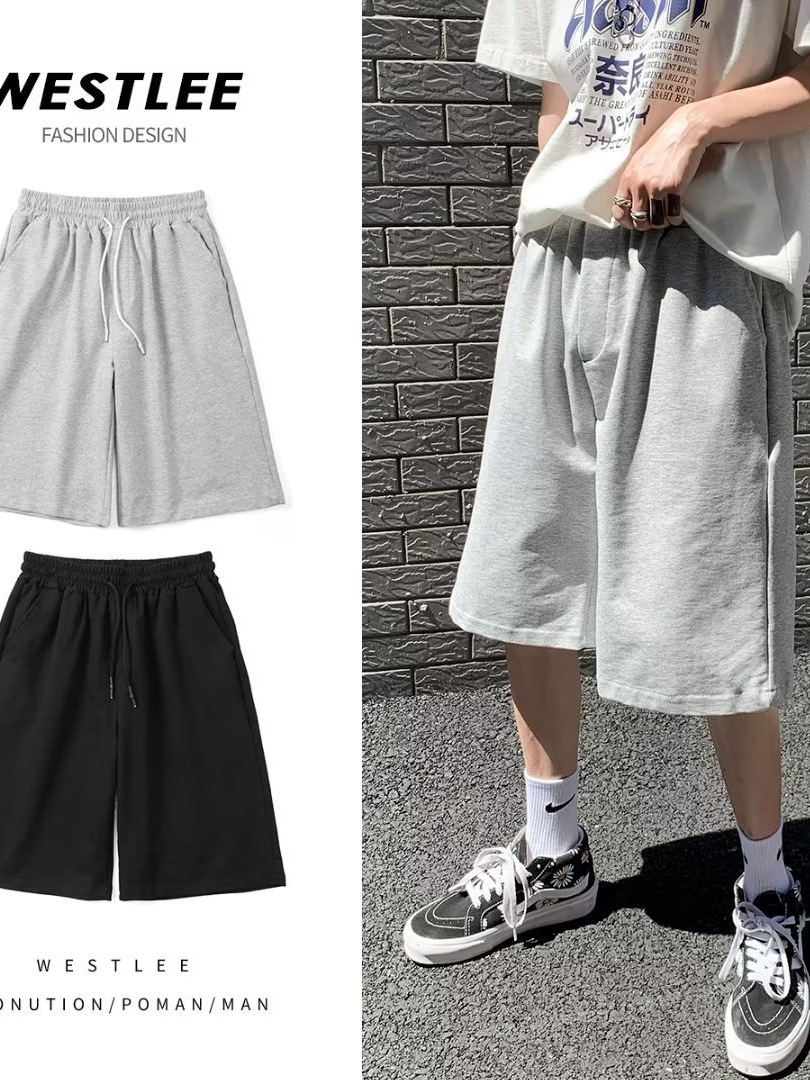 Pantalones de moda para hombres, pantalones casuales coreanos sueltos, versátiles, cinco puntos, pantalones de playa de nuevo tamaño grande de verano