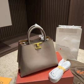 2025新款tod真皮牛皮水桶包购物小托特包手提单肩包大容量奶茶包