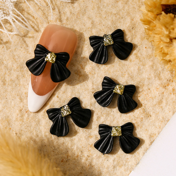 Japanese golden three dimensional spray for manicure with bow