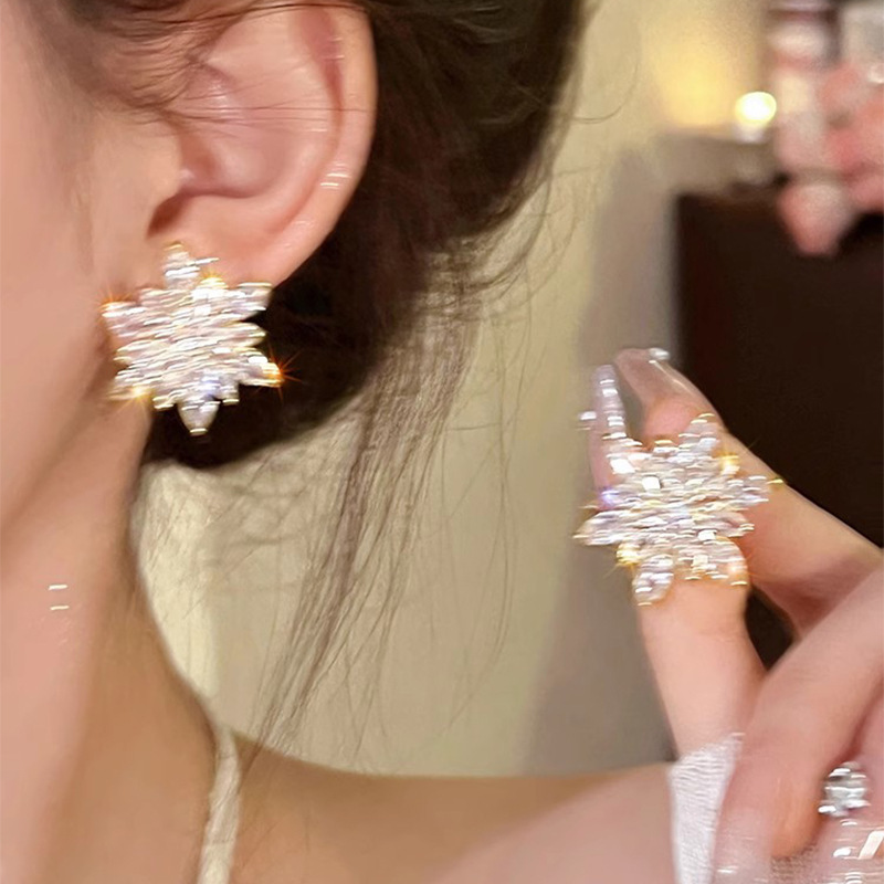 2026 viento falso sensación de atmósfera super inmortal pendientes de flores de malla temperamento suave de chiffon para mujeres pendientes