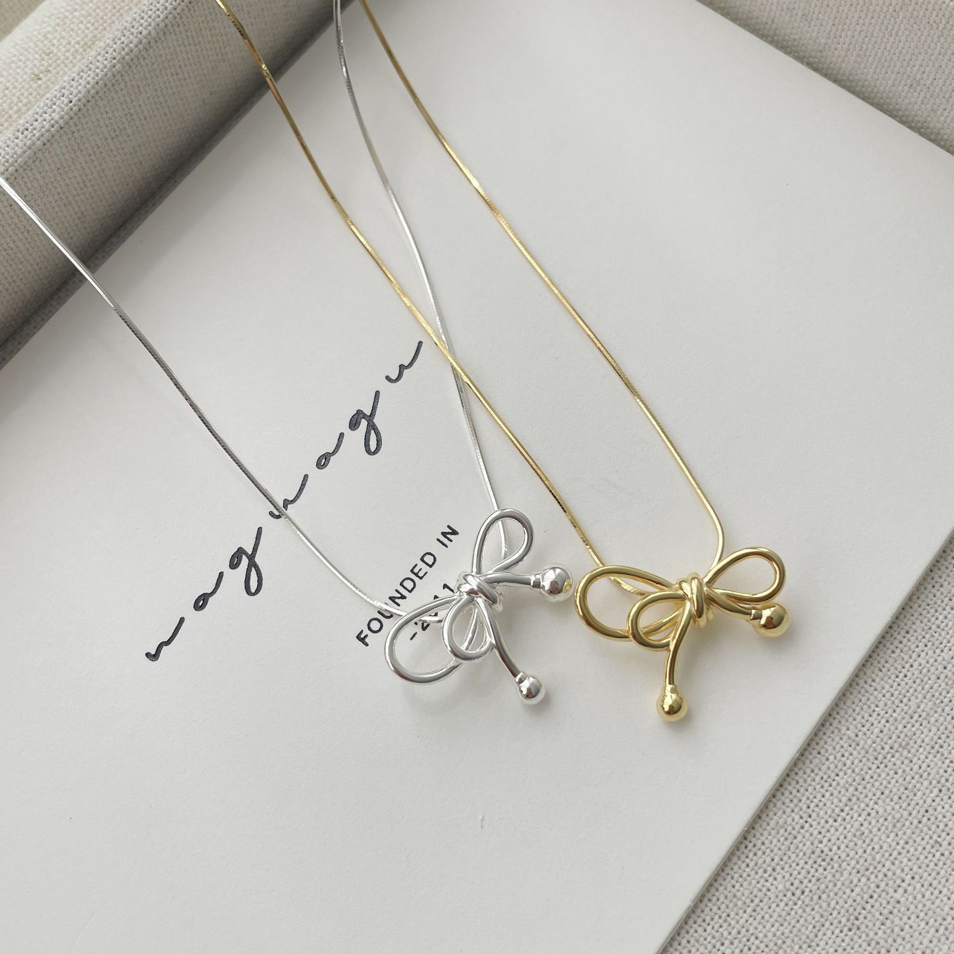 Sterling Silver Simple Style Classic Style Bow Knot Plating Pendant Necklace display picture 4