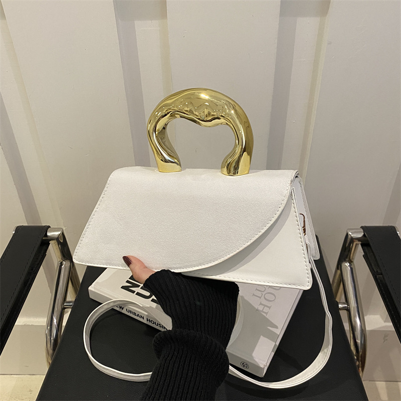 Bolsos pequeños con textura de estilo occidental para mujer 2025 nuevo estilo de este año bolso de mensajero de color sólido tendencia de moda bolso cuadrado pequeño portátil