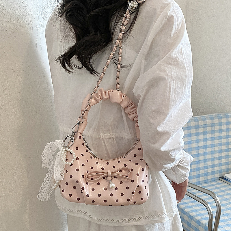 Coreana estilo extranjero suave bolso plegable mujer verano 2026 nueva moda diaria cadena mochila de hombro