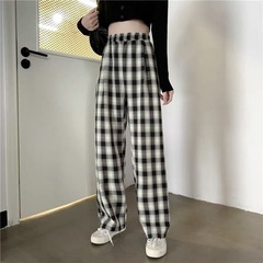 古典的な格子の広脚ズボンの女子学生は腰が高くてゆったりしています。