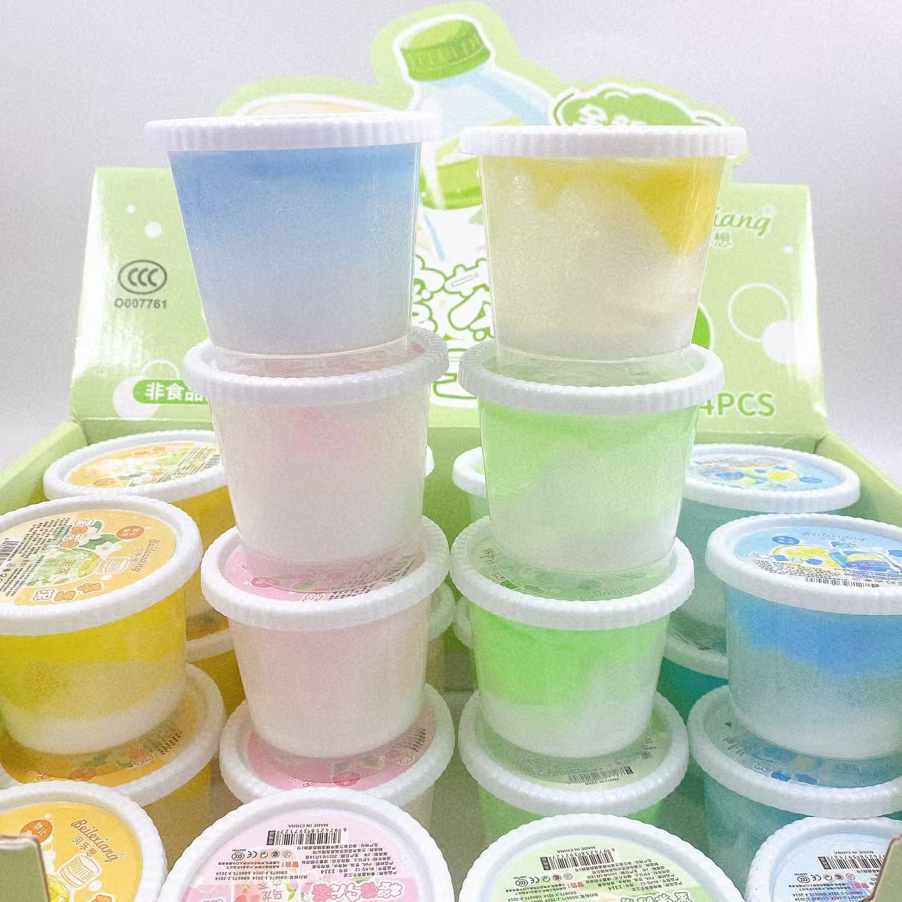 Nuevo plástico espumoso creativo botella redonda de barro de cristal Slime caja de color degradado de dos colores descomprime juguetes al por mayor