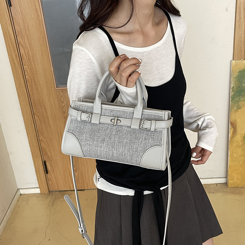 Bolsa de brazo retro simple de contraste de color de mujer botón de metal casual bolso diario de mano de viaje universal mochila de hombro