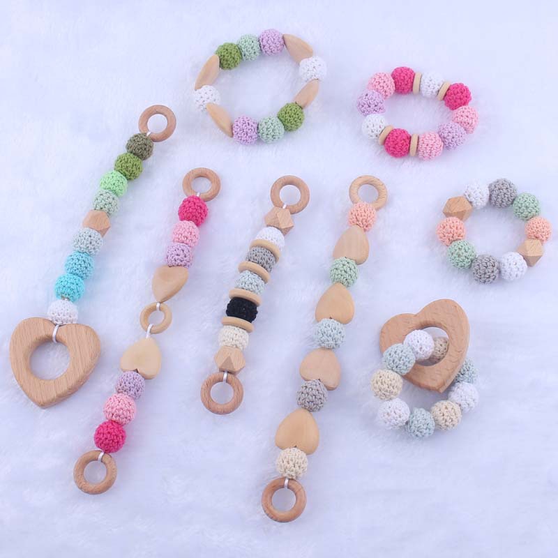 Nueva historieta del bebé haya amor mordedor juguete DIY macaron gran bola de lana mordedura pulsera