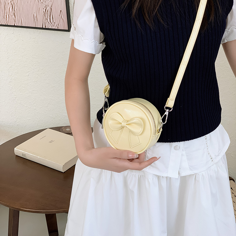 Hermosa bolsa de hombro para chicas de arco, mini bolsa de bebé simple de color sólido, bolsa de cambio para niños de moda