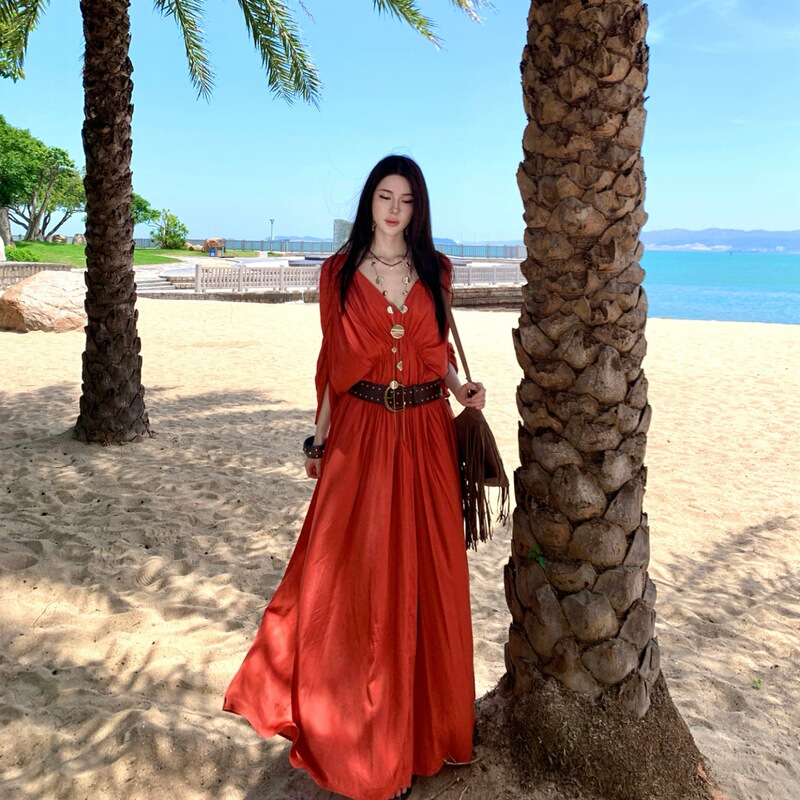 Red bohemian dress for women in autumn, suitable for Xinjiang travel, beach photoshoot, and photography