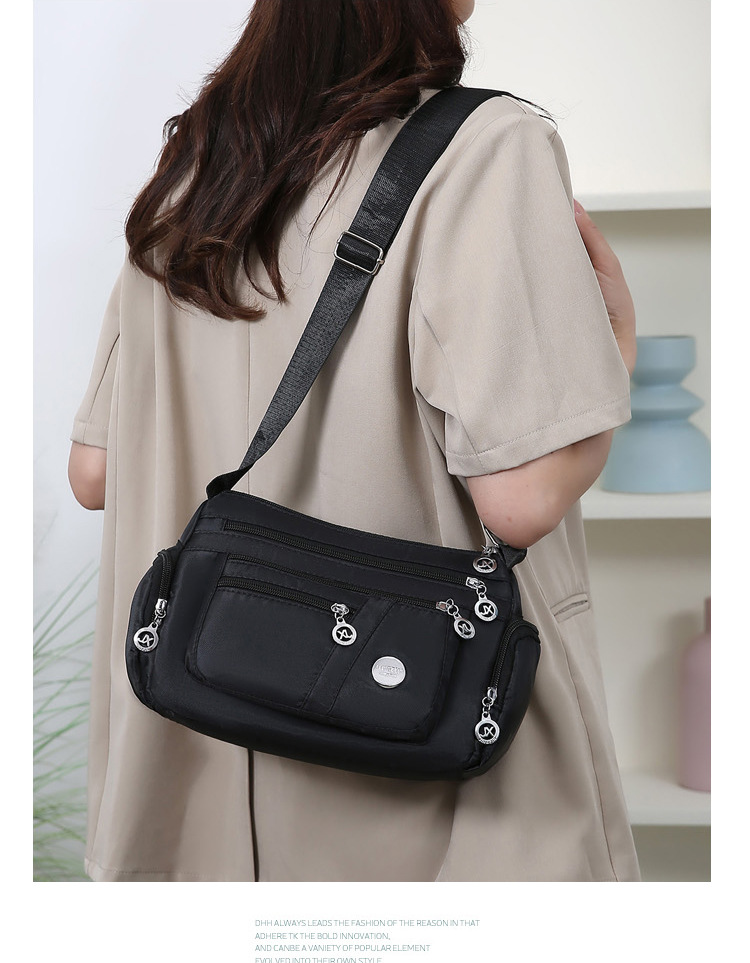 A new popular women's crossbody bag with multiple layers made of Oxford fabric, fashionable, casual and trendy. It's a single-shoulder bag for middle-aged and elderly mothers undefined