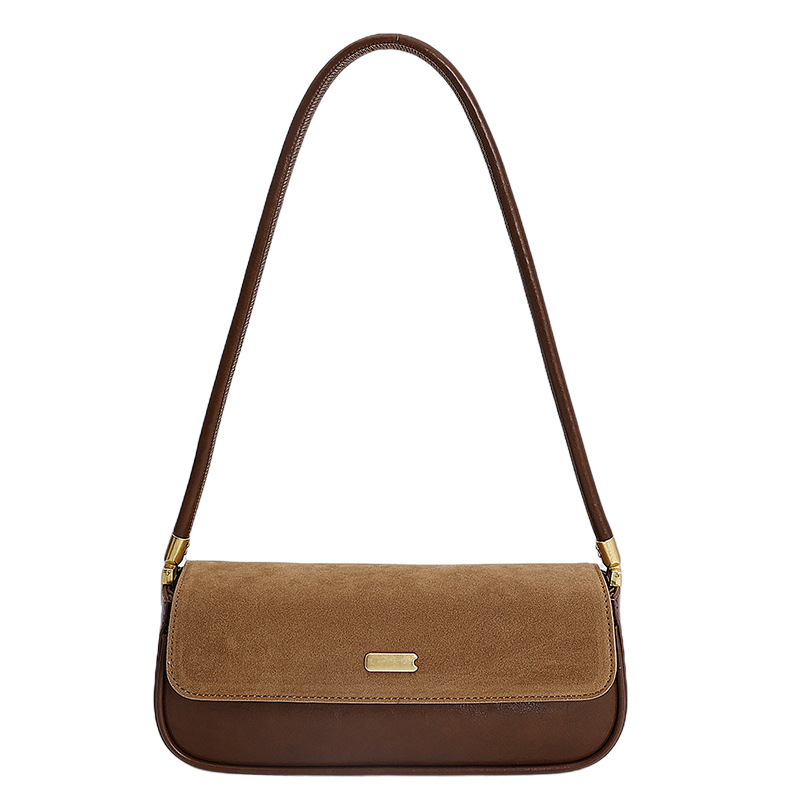 Bolsas de brazo retro de moda transfronteriza mujeres 2025 invierno nuevo estilo francés nicho bolsas de palo de moda bolsas de hombro casuales