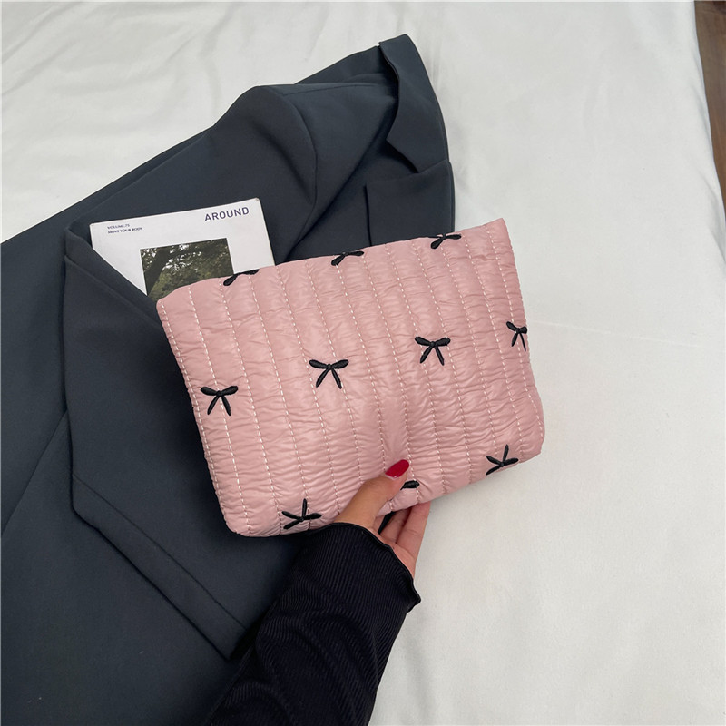 2025 invierno nueva moda portátil bolso de mano mecha de moda impresión mariposa de maquillaje de gran capacidad bolso de mano