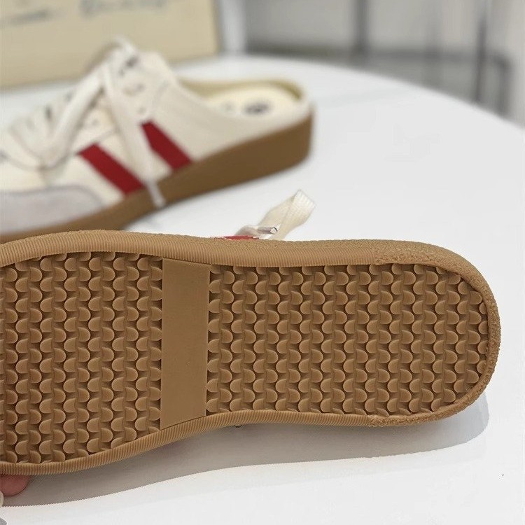 Zapatos de entrenamiento de base suave para mujeres de verano 2026 nuevos zapatillas de cabeza de bolsillo retro sin talón de un pie de zapatos de mujer