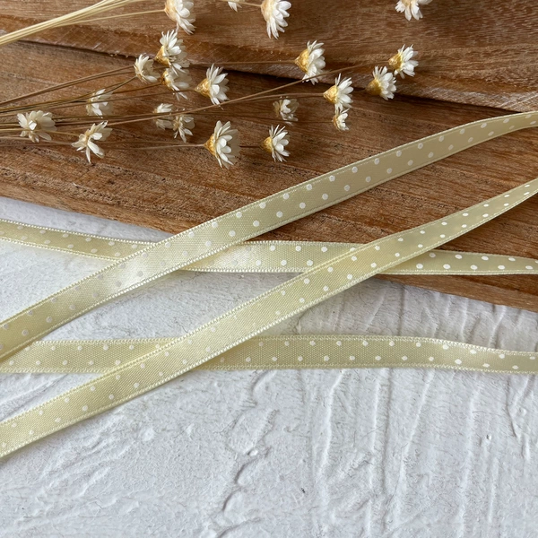 Light yellow, double-sided polka dots, 0.6 cm wide, 1 meter long