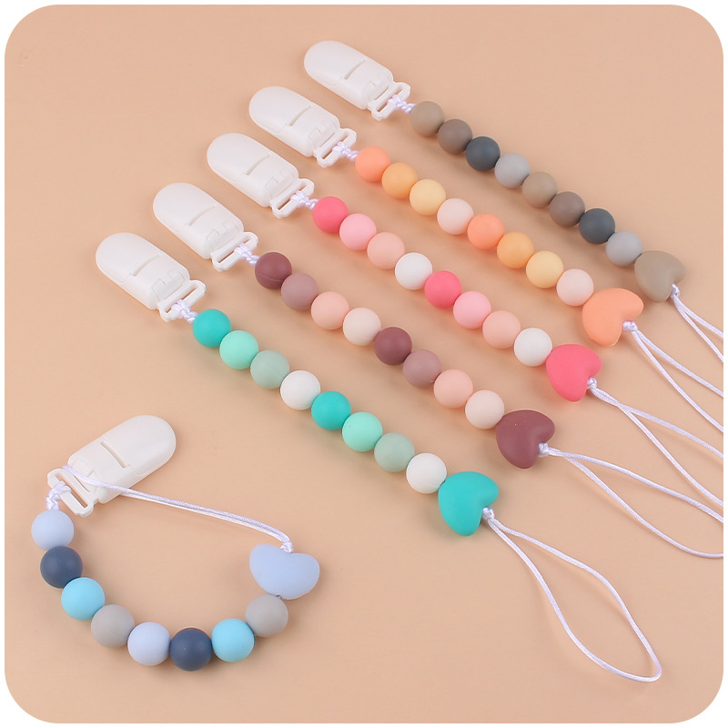 Bebé suministros chupete cadena creativa de dibujos animados amor cuentas de silicona mordedura cadena anti-gota molar Nuevo