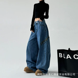 美式复古豹纹拼接弯刀牛仔裤女2026年春夏新款设计感直筒阔腿裤子