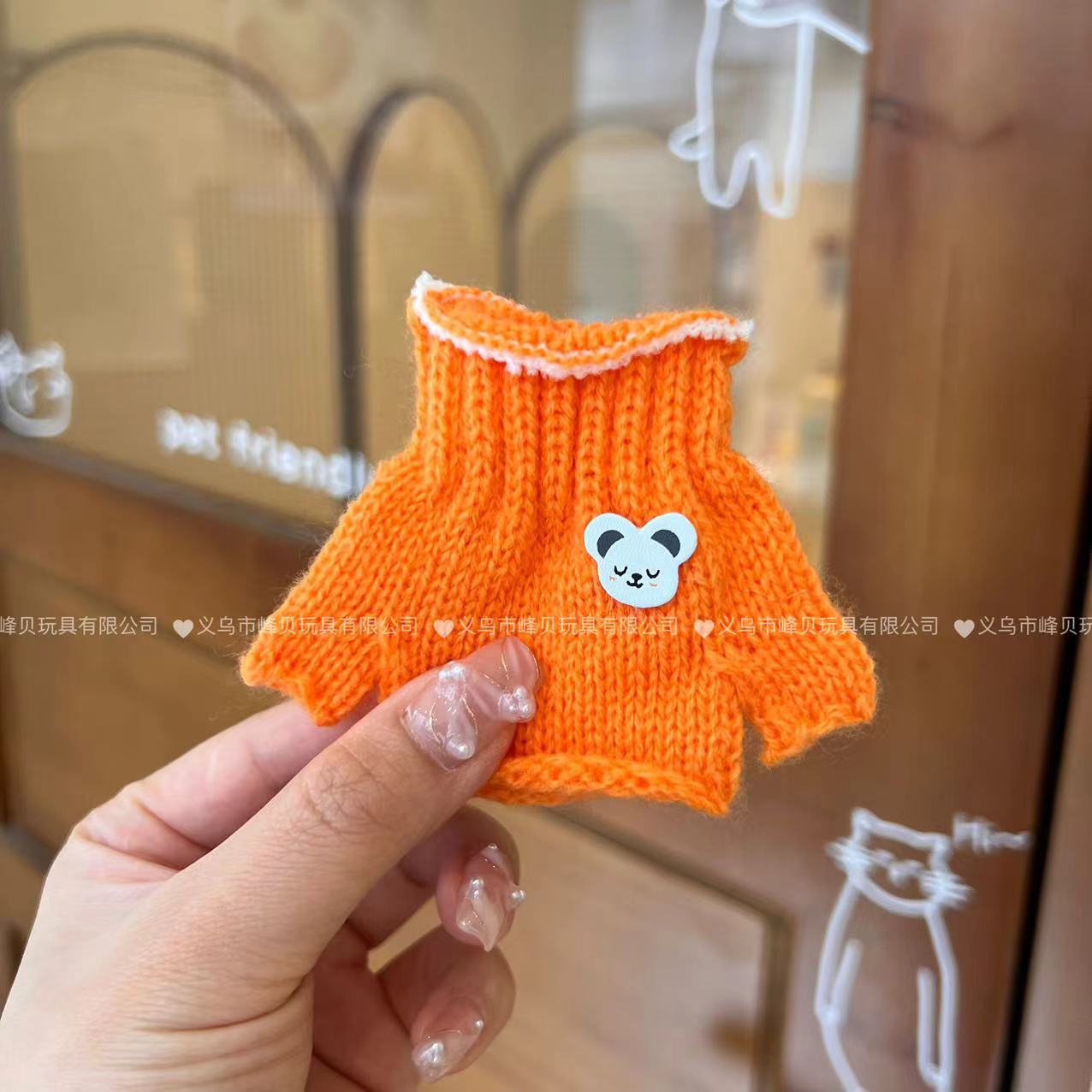 Orange knitted turtleneck sweater