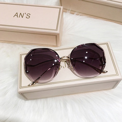 New fashionable rimless sunglasses for women, multi-shaped metal arc temple, popular street style sun protection sunglasses
