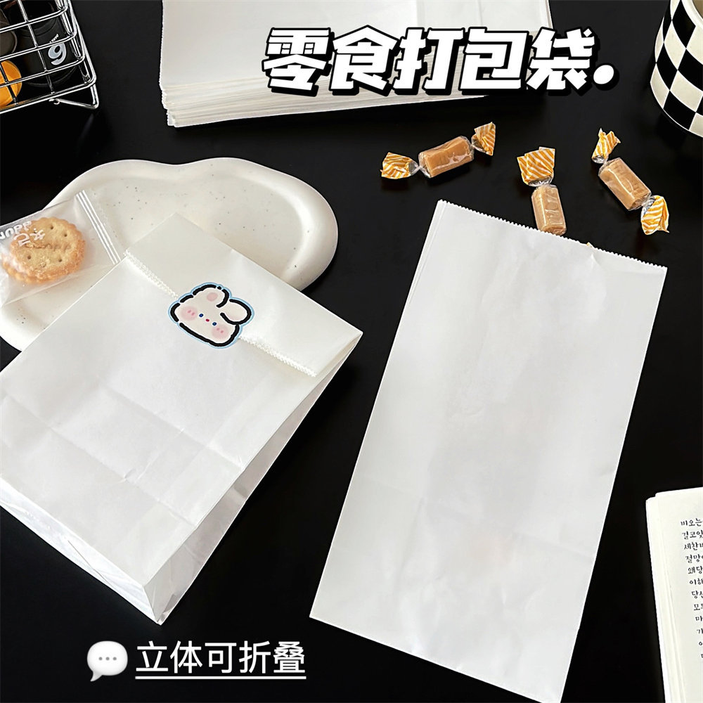 Nueva bolsa de papel Kraft blanca de alta apariencia ins estilo embalaje de la tarjeta bolsa de regalo cubierta de la tarjeta de embalaje bolsa decorativa al por mayor