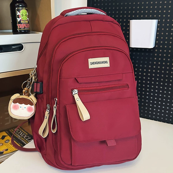 Red backpack, doll