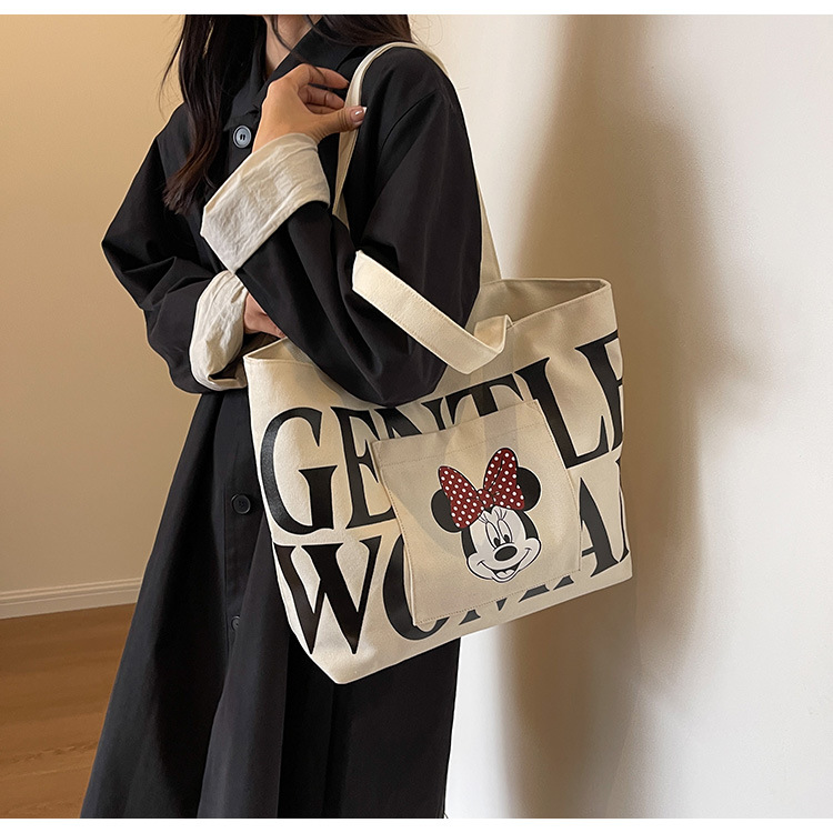 2024 New canvas bag for women, single-shoulder, student, book, large-capacity hand-held bag with zipper, versatile for office workers' commuting undefined