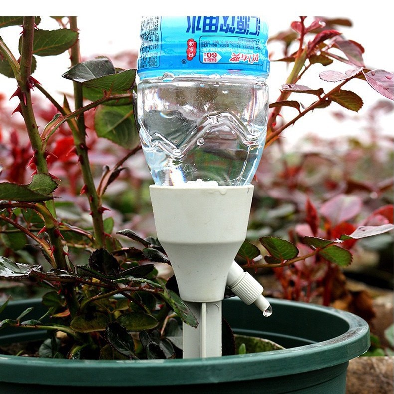 새로운 꽃 물을 게으른 남자 유물 도저 자동 꽃 물을 장치 녹색 식물 시간 누출 장치 자동 물방울 관개 장치 도매
