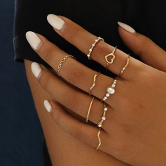 Cross-border best-selling simple new hollow love ring European and American style geometric wave-shaped 9-piece ring set