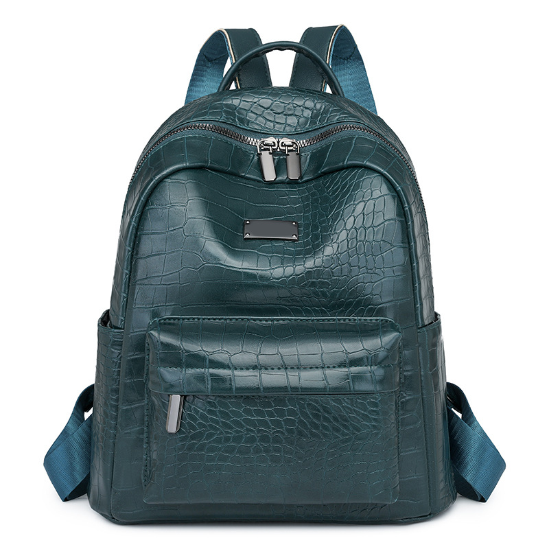 2025 primavera nueva mochila de cuero suave para mujer, mochila de viaje urbano de todo fósforo de moda, mochila escolar para estudiantes universitarios al por mayor