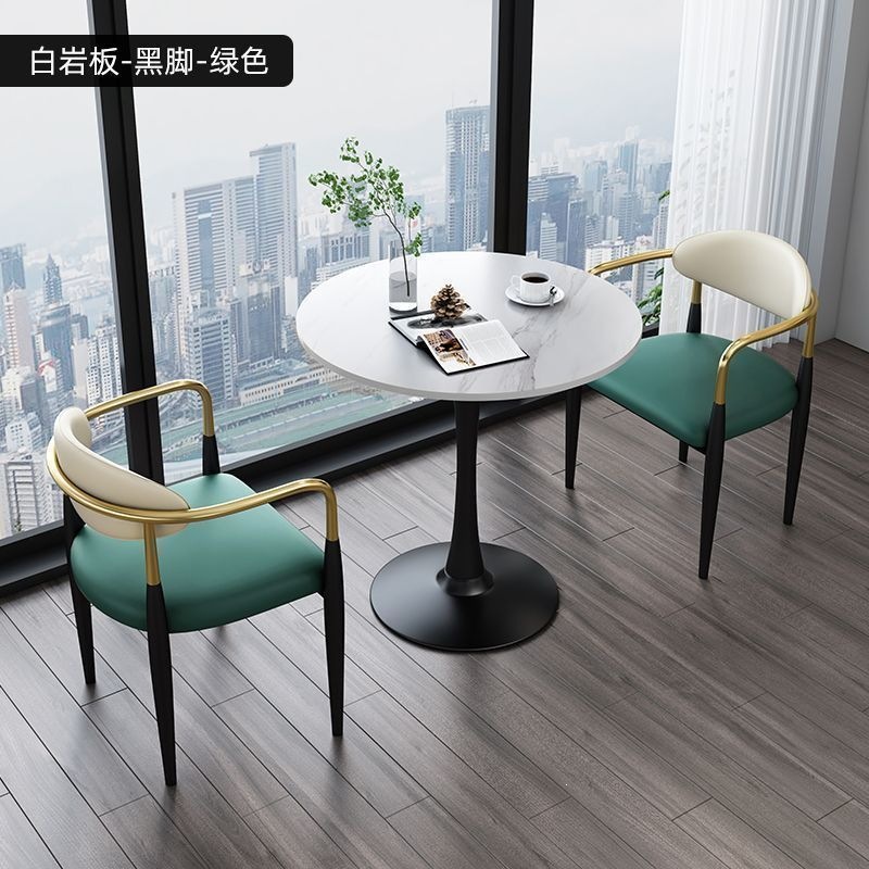 Black legs + white rock slab + green leather, one table and two chairs