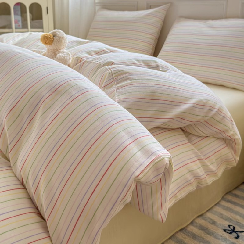 Cama de hilo de doble capa de algodón estilo ins Juego de cuatro piezas Funda de edredón de algodón puro para niños 2025 Nuevo juego de tres piezas de dormitorio de sábanas