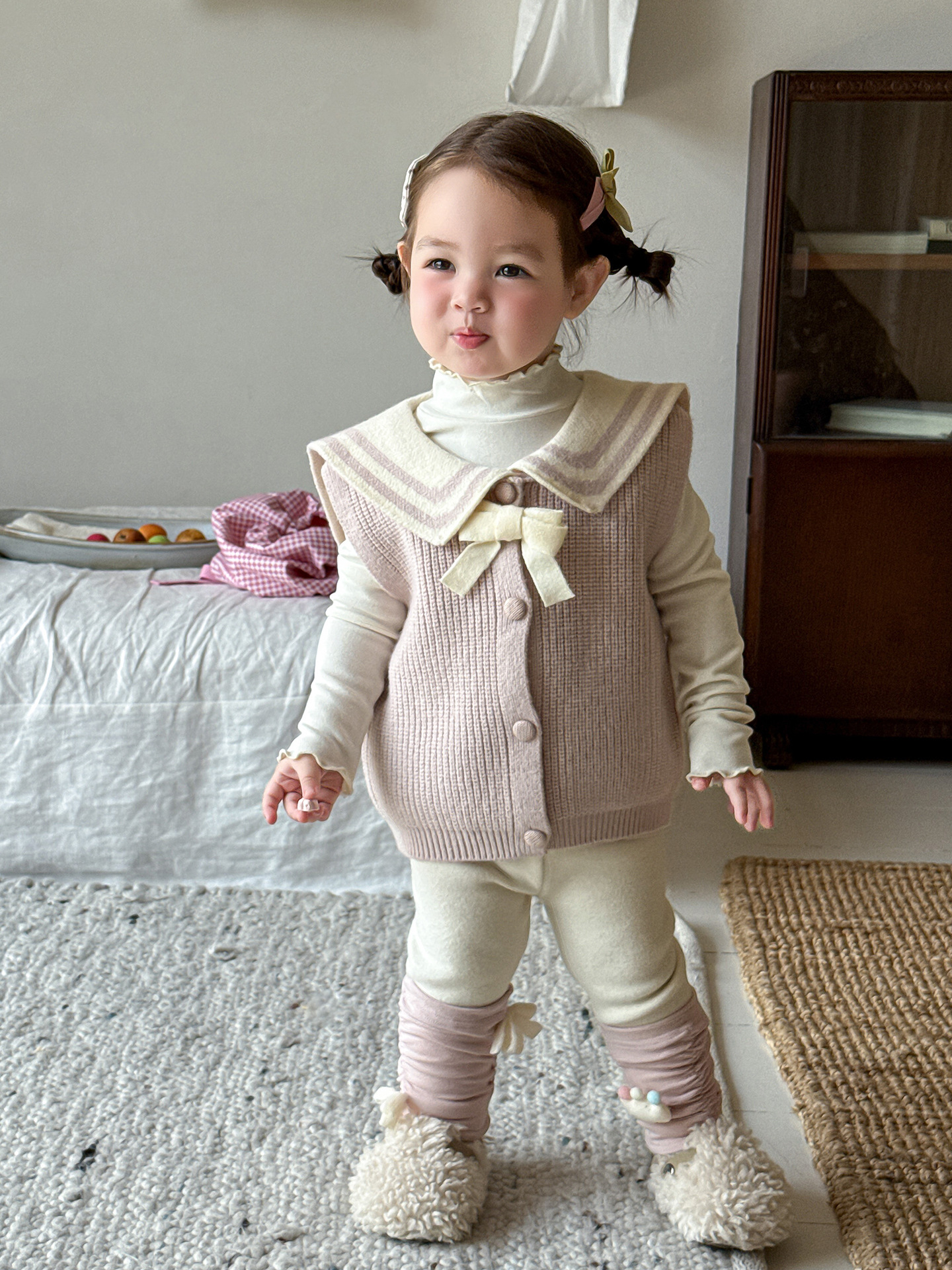 Sugar Pear ropa infantil chaleco de otoño 2025 nuevo suéter de punto para niñas ropa infantil chaleco de bebé de un año