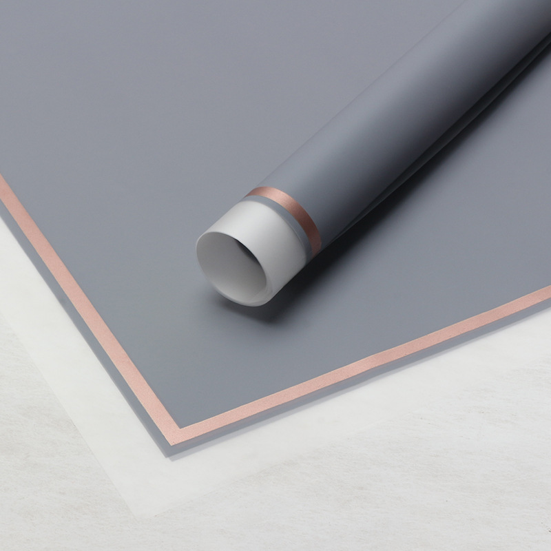 Huaxi transfronterizo Han Bundle de papel volador de película de gel de envoltura de flores impermeable florista suministros de flores papel de envoltura de ramo