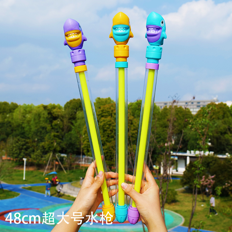 Pistola de agua para niños juguete dinosaurio unicornio pistola de agua tipo de extracción de agua de gran capacidad para niños playa al por mayor