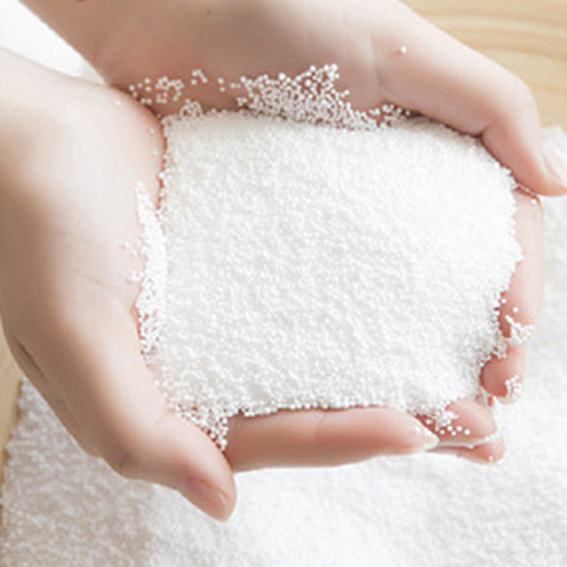 White 0.5mm eps particles]