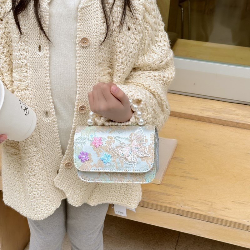 Bolsas de niños nuevas bolsas de mano de perlas de estilo nacional, bolsas de cadena de arco de bordilla princesa, bolsas de hombro de moda nacional de niñas lotes