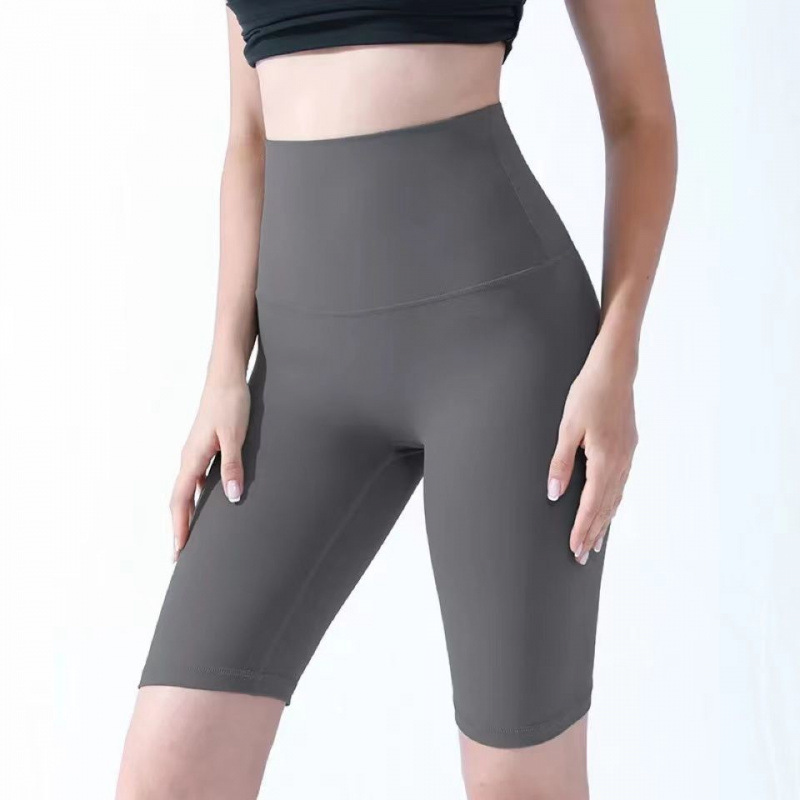 Pantalones cortos desnudos de mujer elásticos apretados para elevar las caderas de cinco puntos pantalones deportivos de secado rápido succión de sudor entrenamiento para correr fábrica de comercio de ping