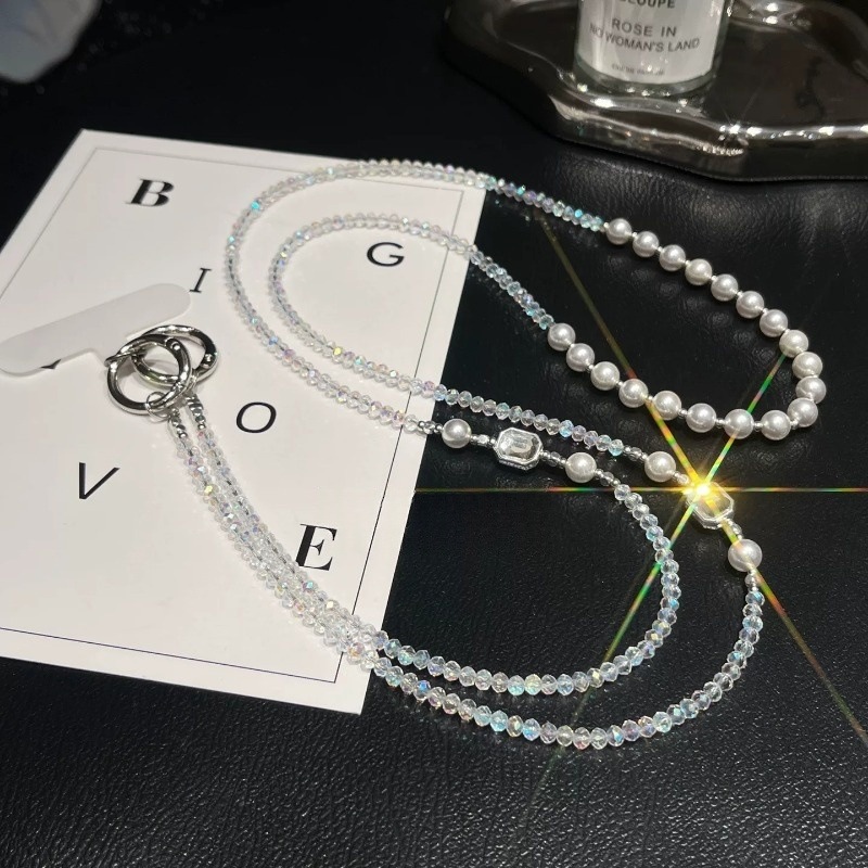 Fashionable beaded crystal phone charm, high-end pearl necklace, long crossbody strap, anti-loss phone lanyard.