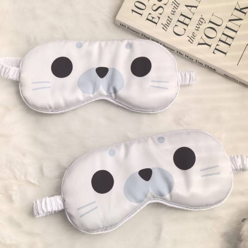 Cute little seal eye mask for naps, featuring a trendy and stylish design, made of breathable and comfortable ice silk material, with a cartoon pattern and double-sided blackout function to protect your eyes