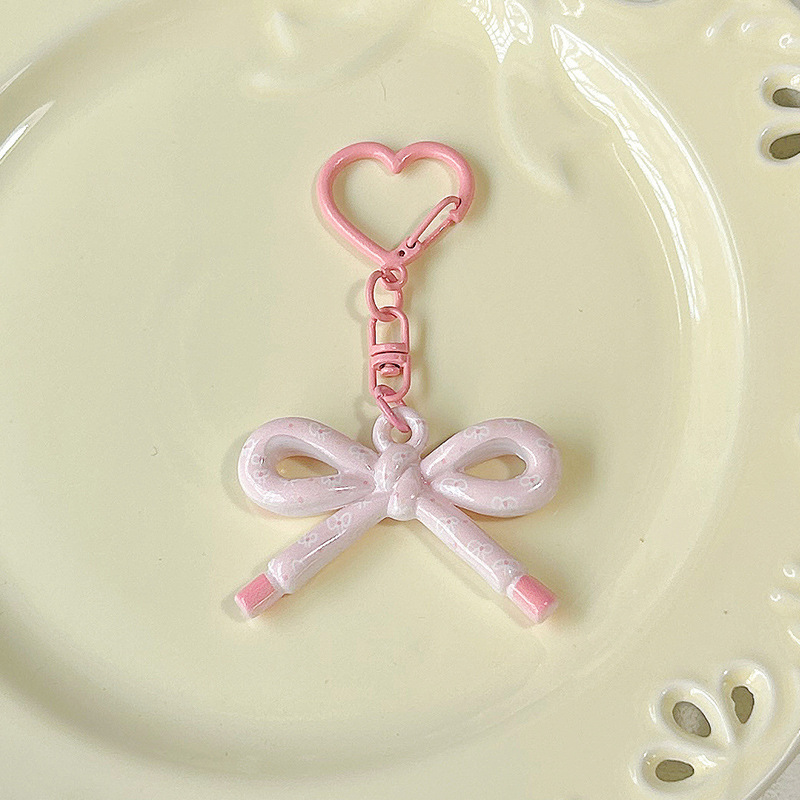 かわいい両面プリント中空弓キーホルダー diy ジュエリーペンダントバッグ携帯電話ペンダントギフトアクセサリー|undefined