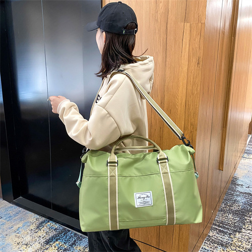 New short-distance business trip travel bag, women's large-capacity shoulder hand-held luggage bag for maternity, can be placed in a trolley suitcase luggage bag