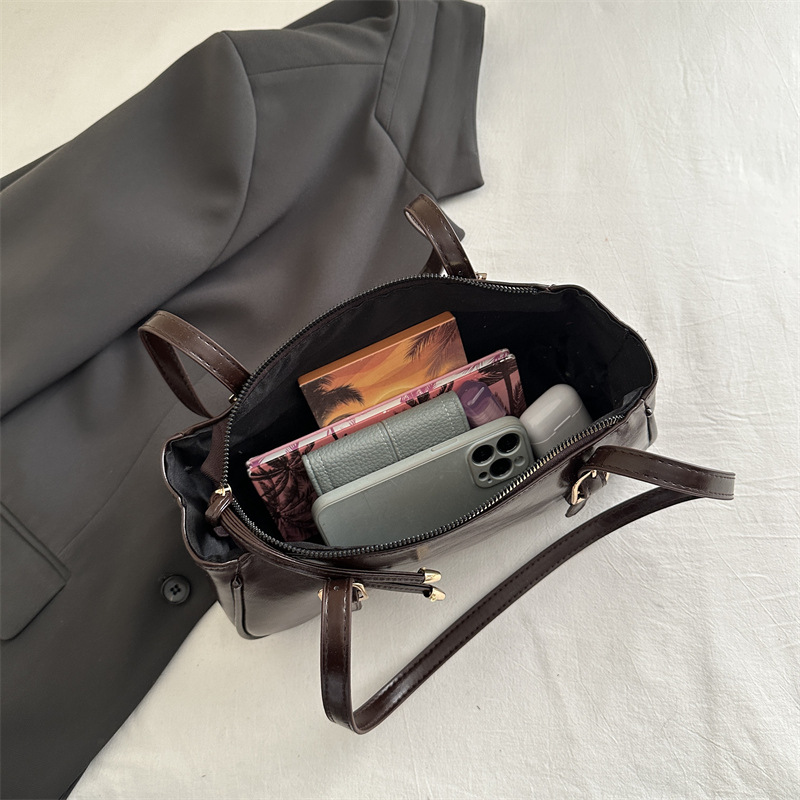 Borsa baguette a spalla elegante e testurizzata per donna_voghion.com