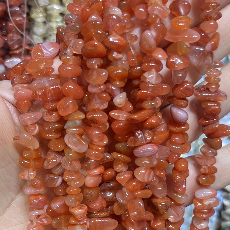 Natural grade a southern red agate strand, approximately 80cm