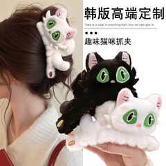 新しい秋冬のぬいぐるみの立体の猫のつかみはかわいい盤を挟みます。
