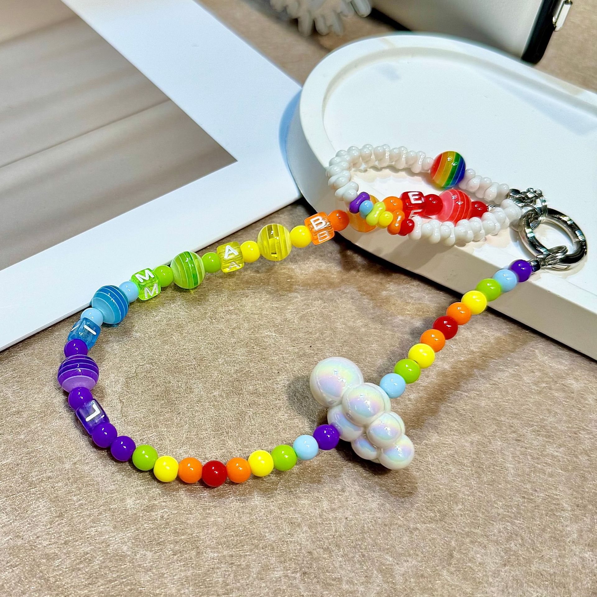 Marca de moda original Rainbow Cadena de teléfono móvil Cadena de teléfono móvil Caja de teléfono móvil Cordón de bolso Colgante de muñeca Estilo ins